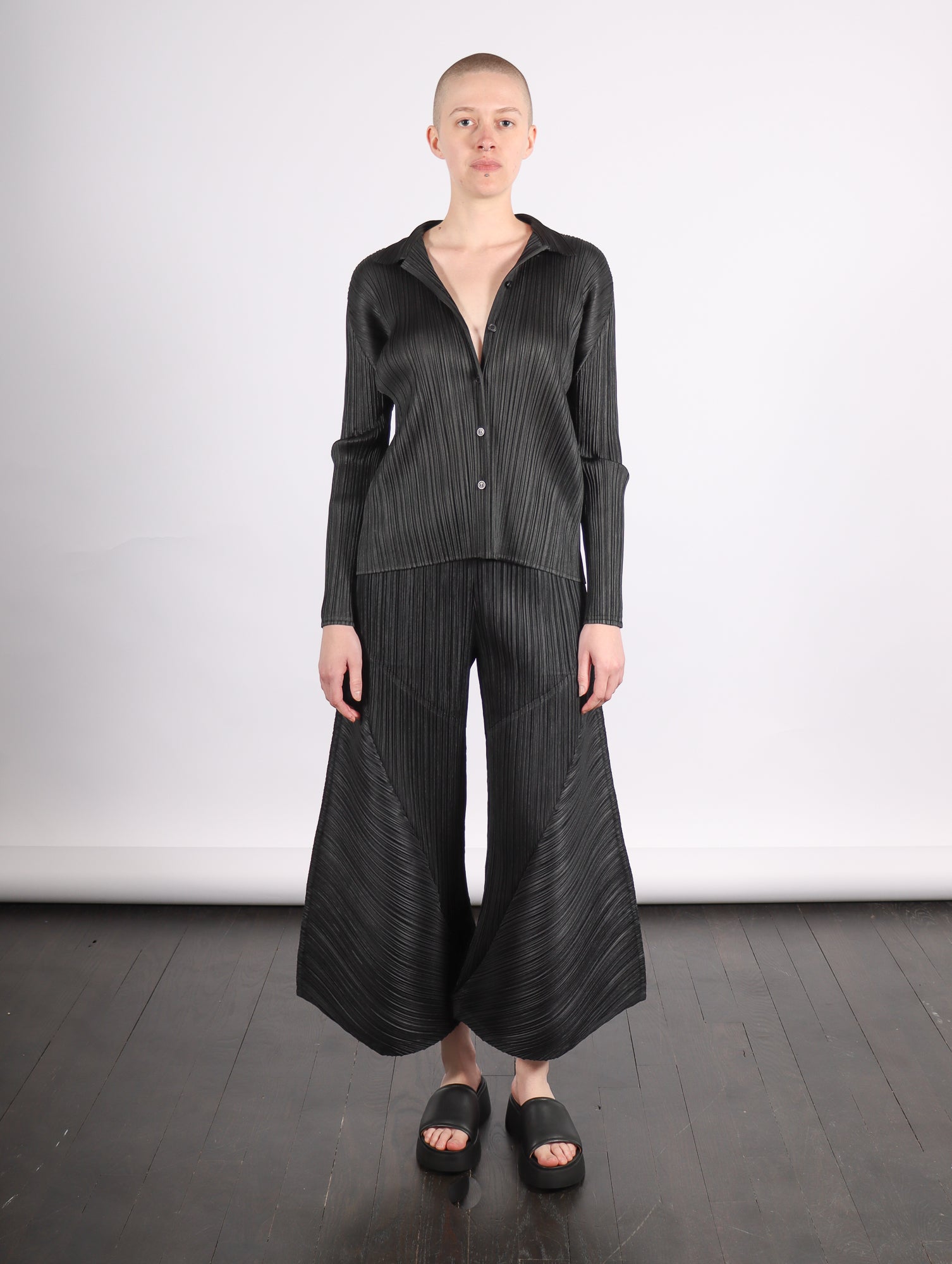 Thicker Bottoms 2 Flared Pants in Black by Pleats Please Issey Miyake –  Idlewild