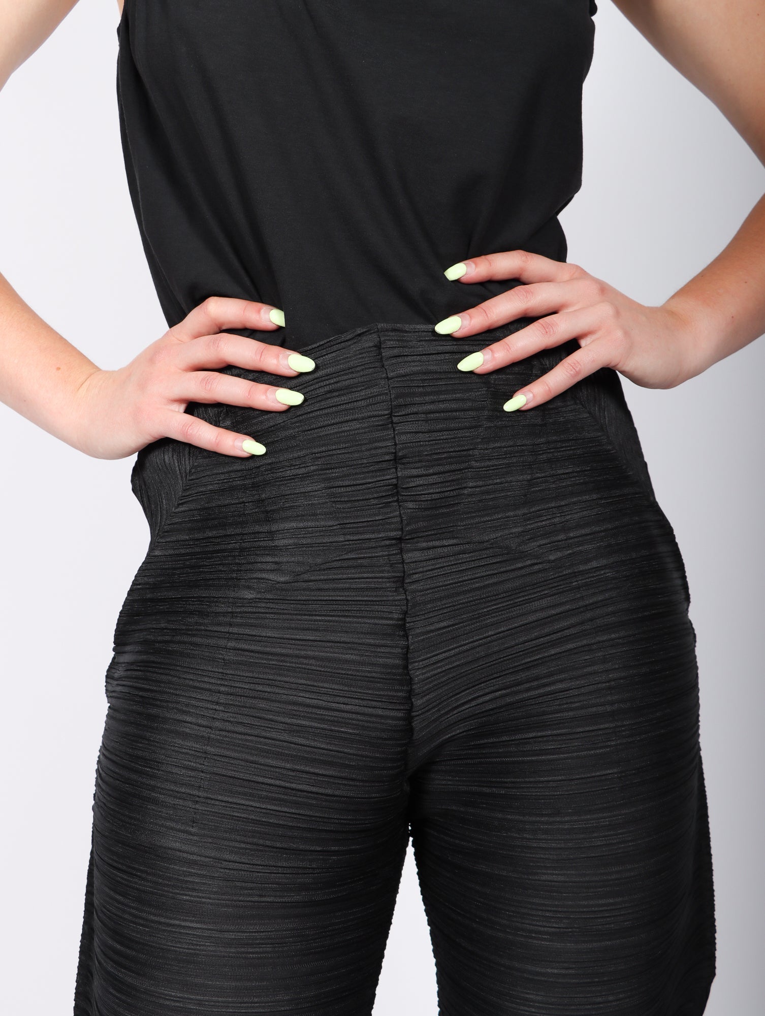 Thicker Bounce Pants in Black by Pleats Please Issey Miyake