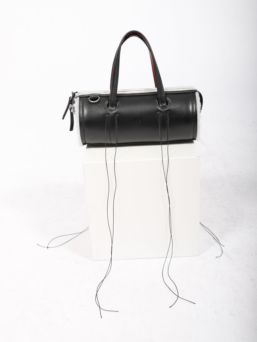 Anona Cylinder Bag in Black by Dentro-Idlewild