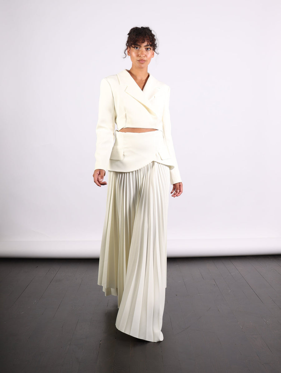 Maxi Pleated Asymmetric Skirt in Ivory by A.W.A.K.E. Mode-Idlewild